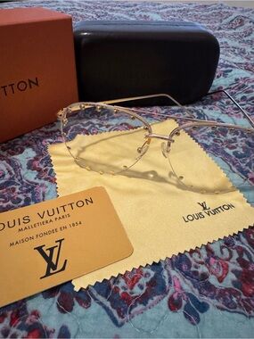 Louis Vuitton Clear Glasses with Gold Studs.